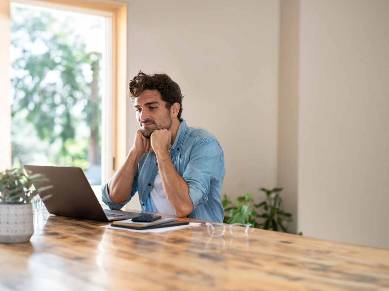 Man looking at laptop